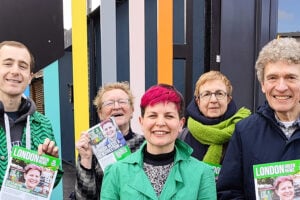 A group of Green Party volunteers posing with London mayoral candidate Zoë Garbett